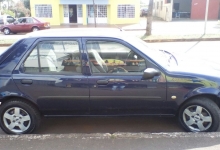 Vendo Fiesta 1.4, ano 97, completo.